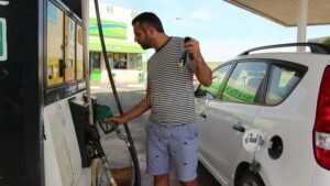 Buying-Gas-In-Station